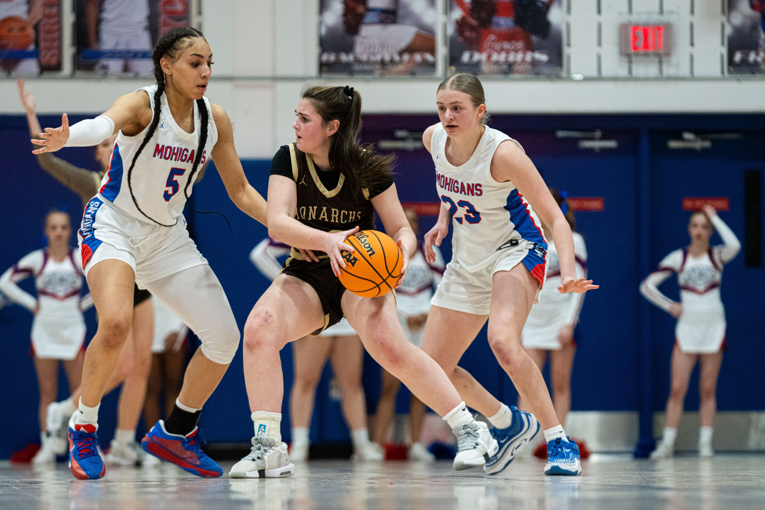 Mohigans flex defensive muscles early against John Marshall to open postseason play